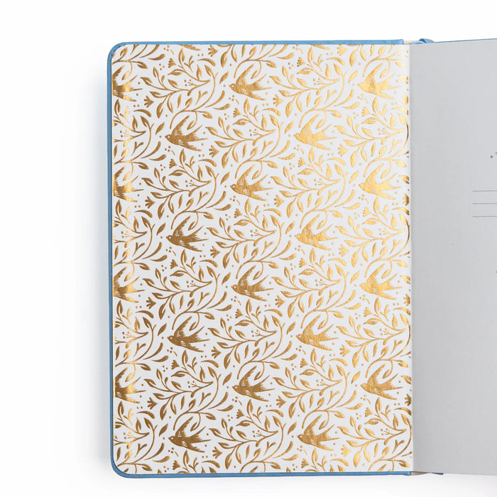 Songbird in Blue Notebook