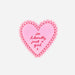 A pink heart-shaped sticker with a scalloped border and the text 'I'm literally just a girl x' in dark pink script, shown on a plain light gray background.